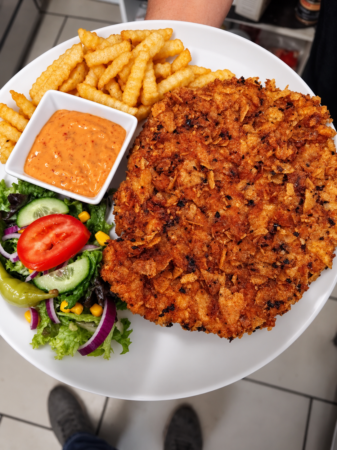 Schnitzelgericht aus dem Angercafé
